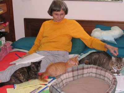 Rhea White and 3 of her Cats